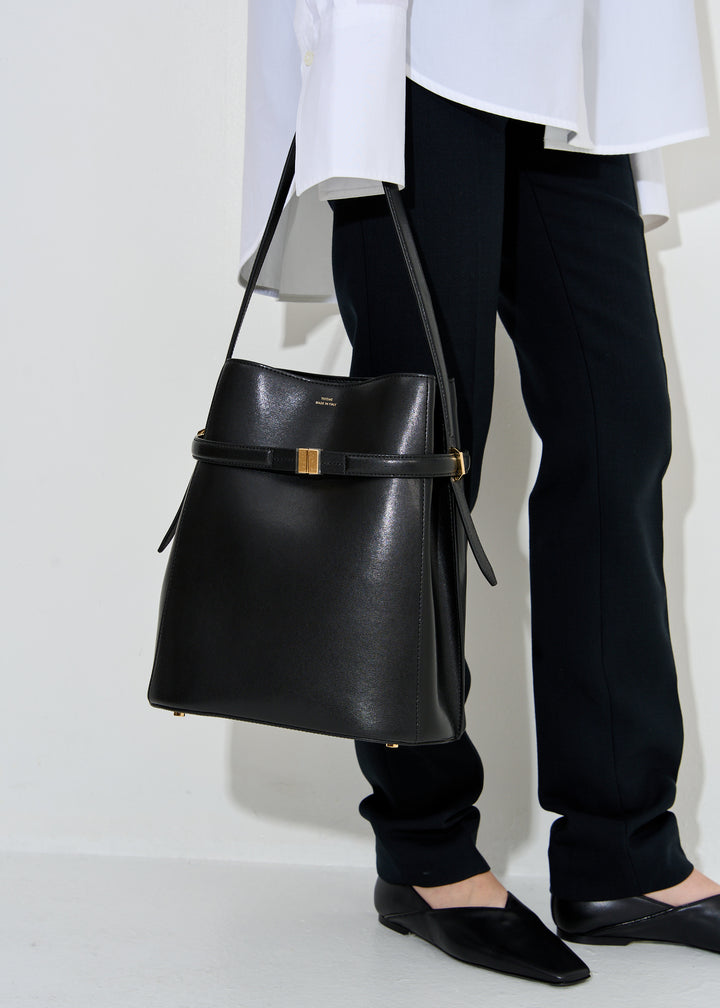 Belted leather bucket bag