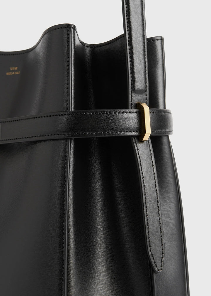 Belted leather bucket bag