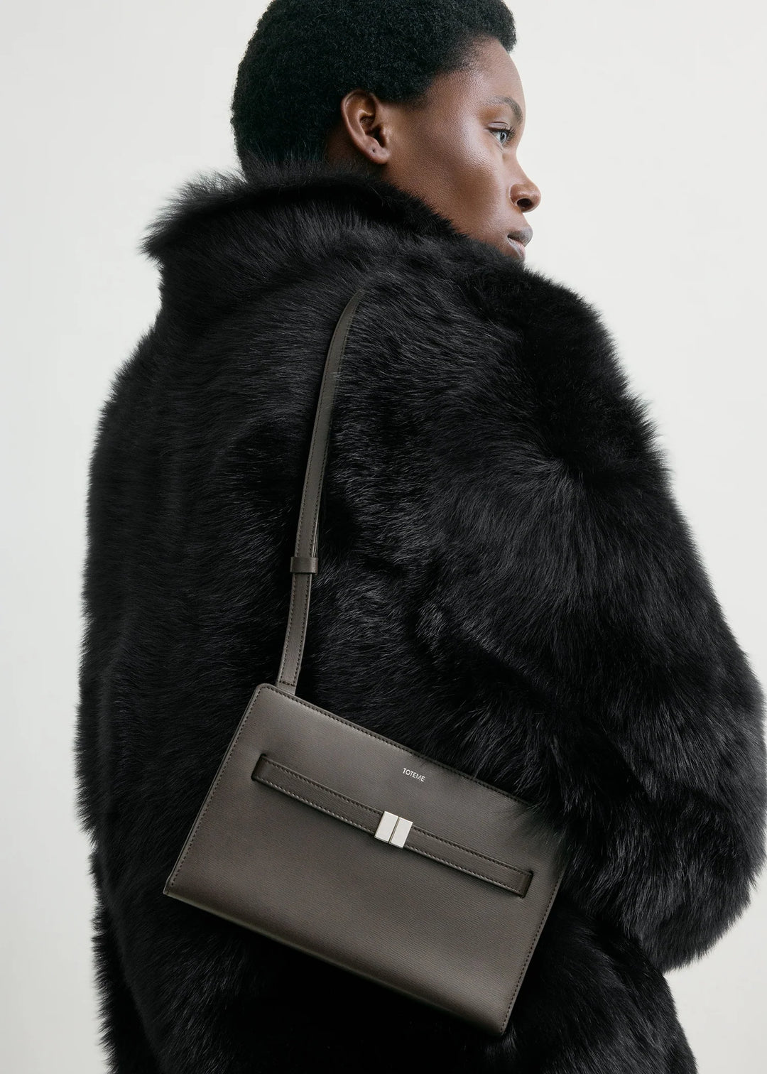 Belted leather crossbody