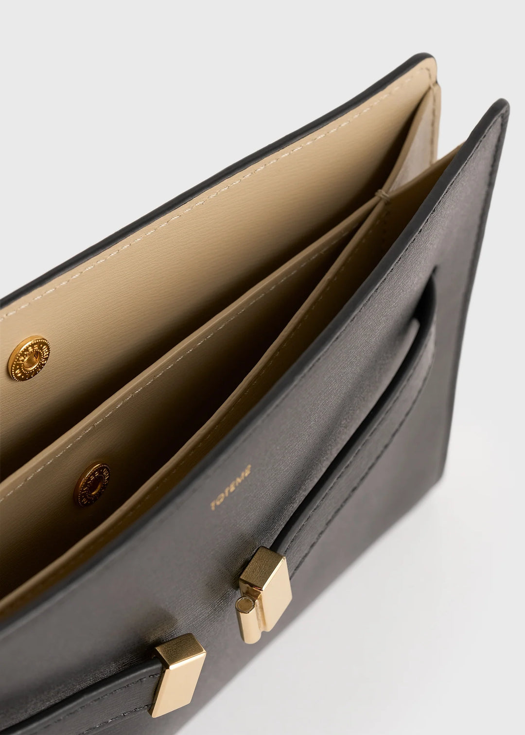 Belted leather crossbody