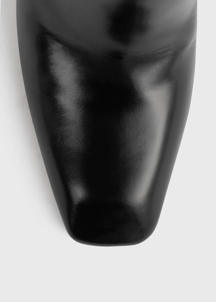 Glossy leather boots