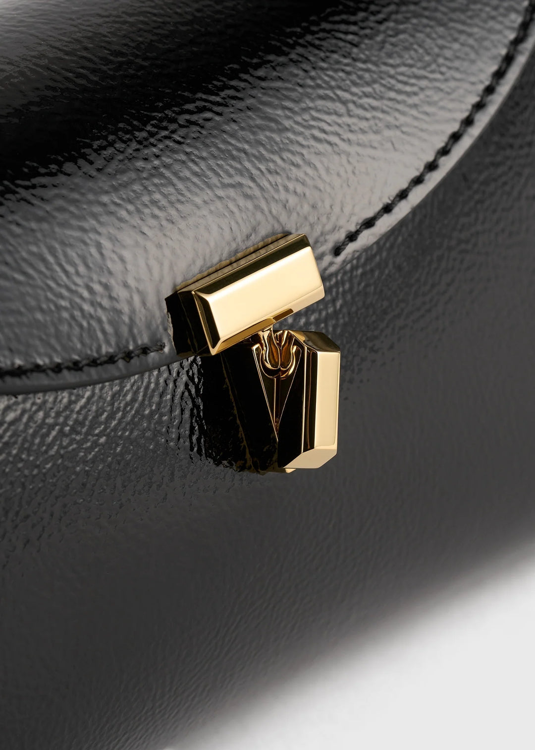 Mini T-Lock Naplack clutch