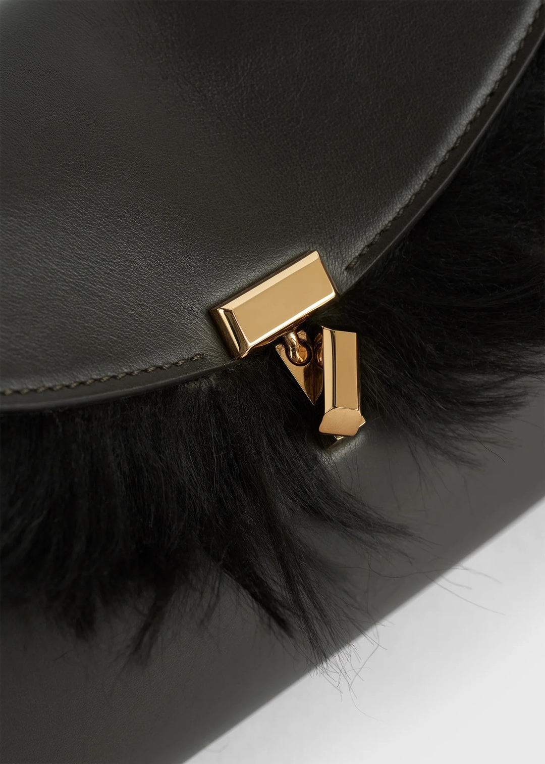 Shearling T-Lock clutch