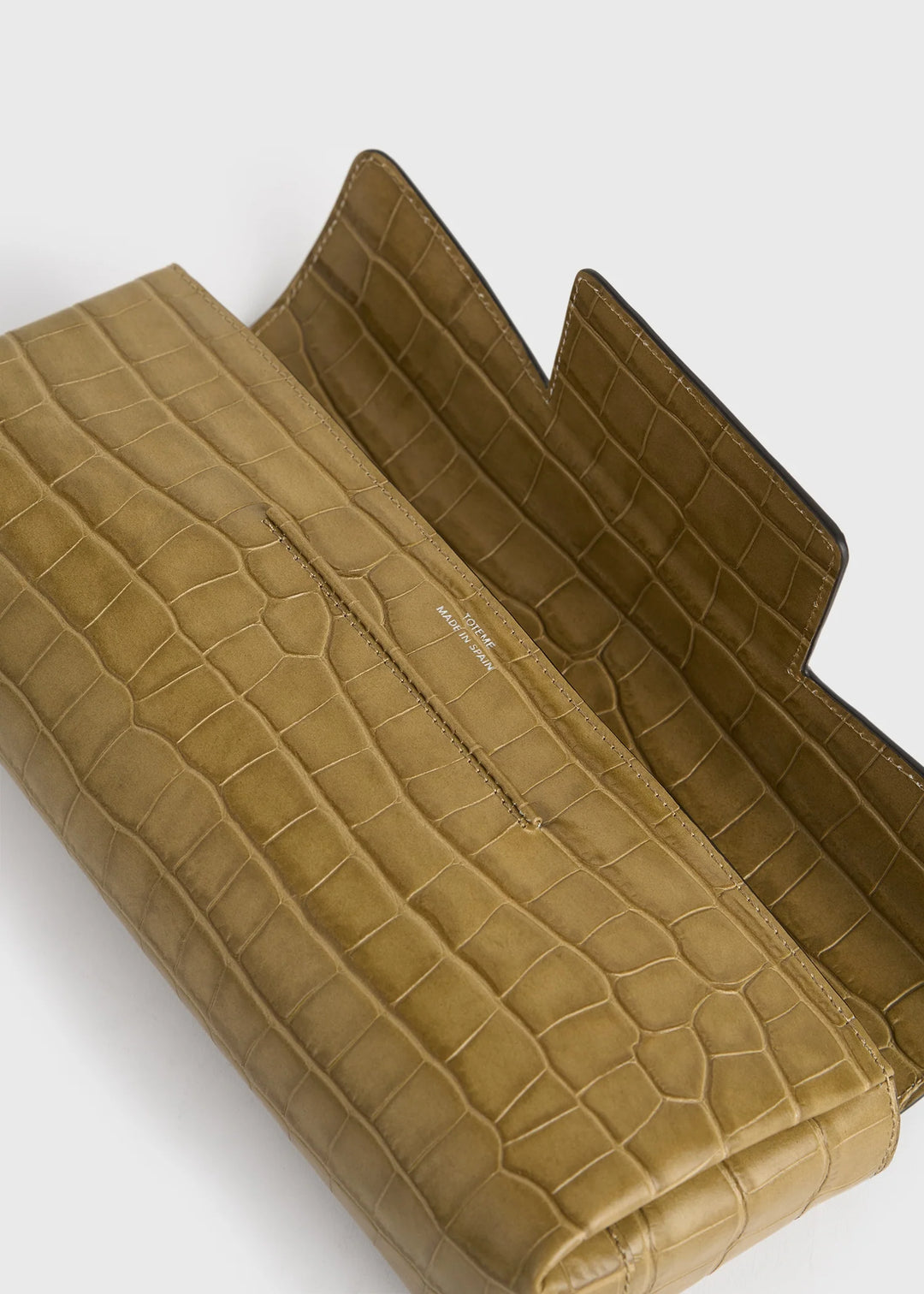Soft croco-embossed T-Clutch