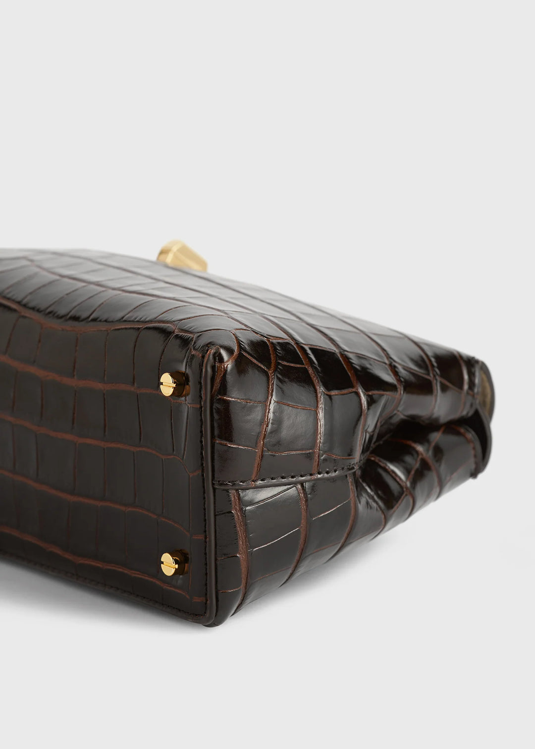 T-Lock croco-embossed clutch