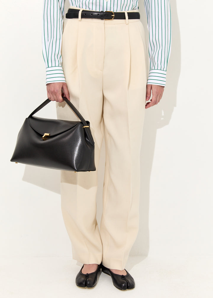 Double-pleated tailored trousers